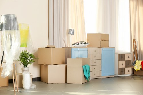 Professional house removalists in Brompton loading furniture into a moving truck