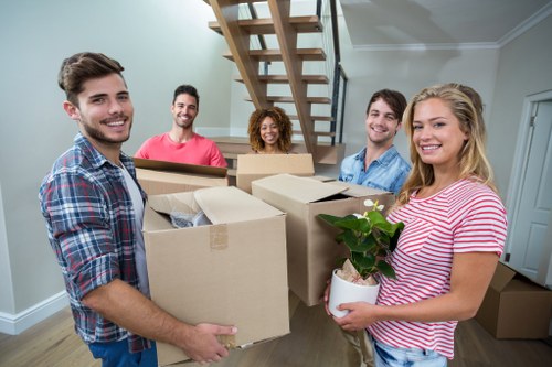 Professional house removals in Brompton with moving boxes and team support