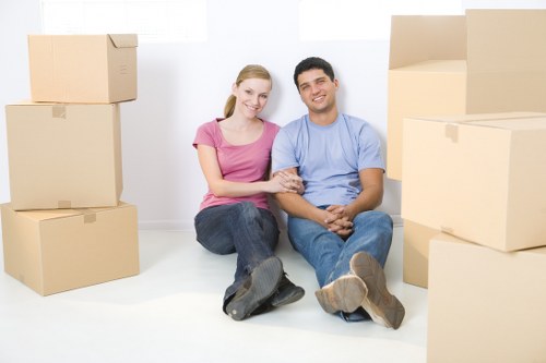 Local Brompton movers handling furniture and boxes carefully