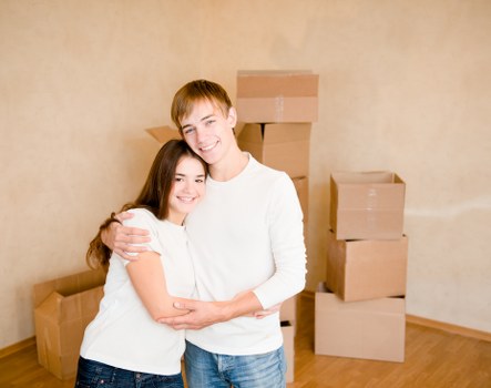 Professional movers packing fragile belongings for a Brompton relocation