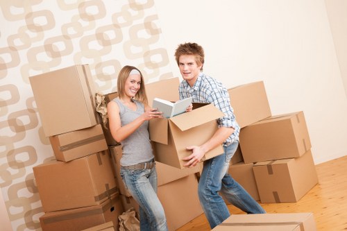 Packed office furniture and boxes ready for relocation in Brompton