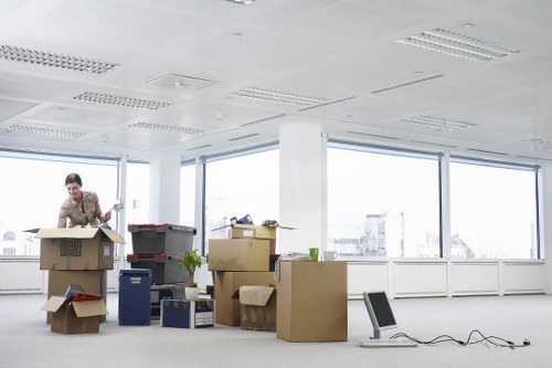 Packed boxes and furniture prepared for a Brompton home move