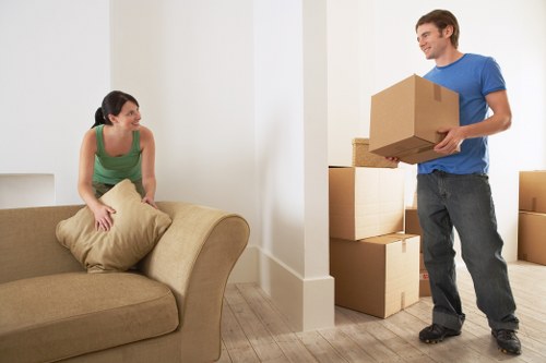 Packed boxes and furniture ready for removal